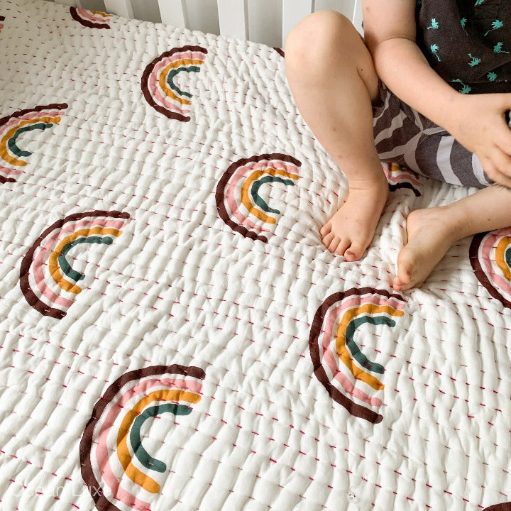 Rainbow cot quilt: Oean Luxe